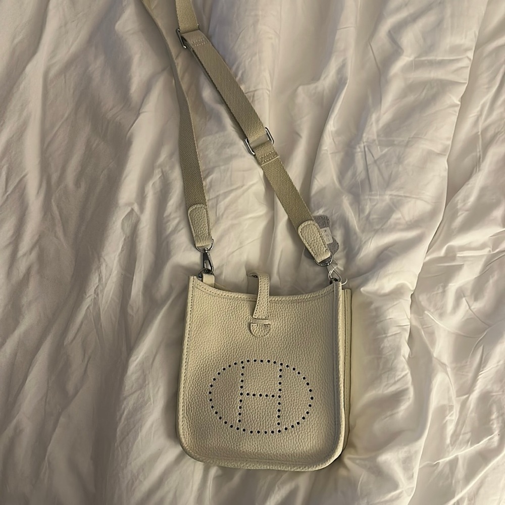 Not authentic mini Evelyne bag.